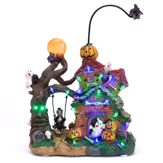 Valery Madelyn Halloween Decorations, Lighted Halloween Village Houses with Music and LED Lights, Resin Spooky Town Flying Witch and Haunted House for Home and Party Table Desk Mantel, 12 Inch